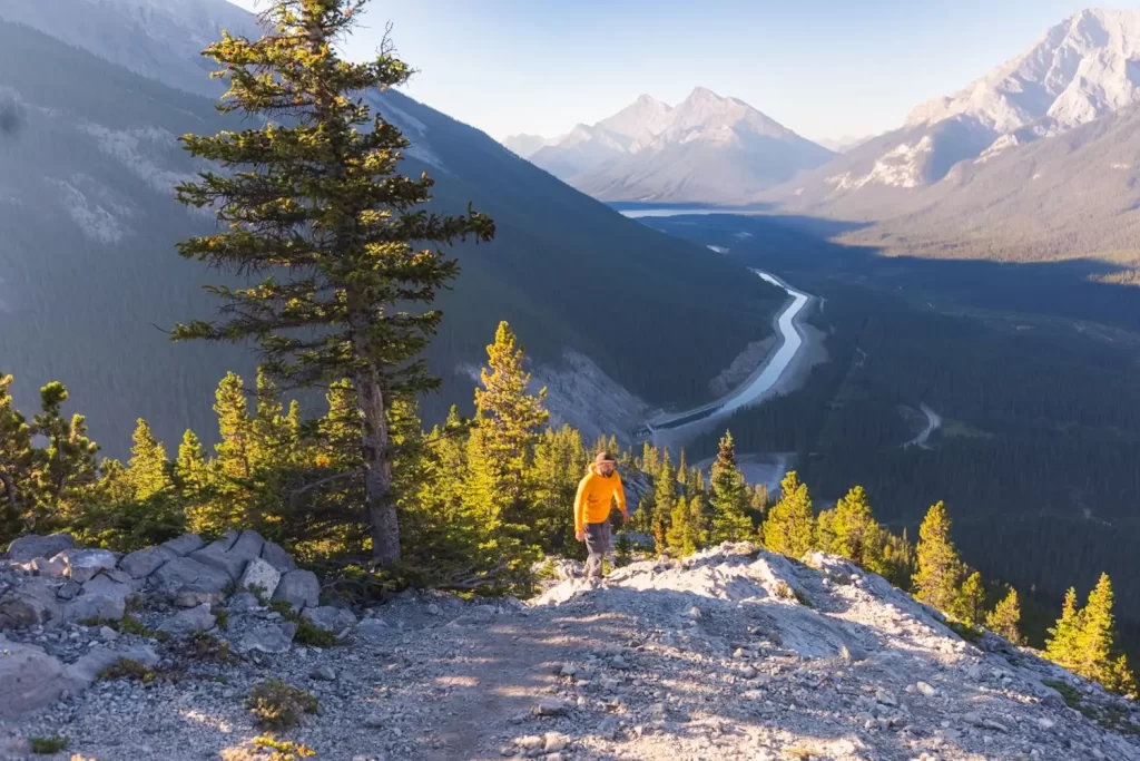 Hiking up East End of Rundle, with a valley visible behind