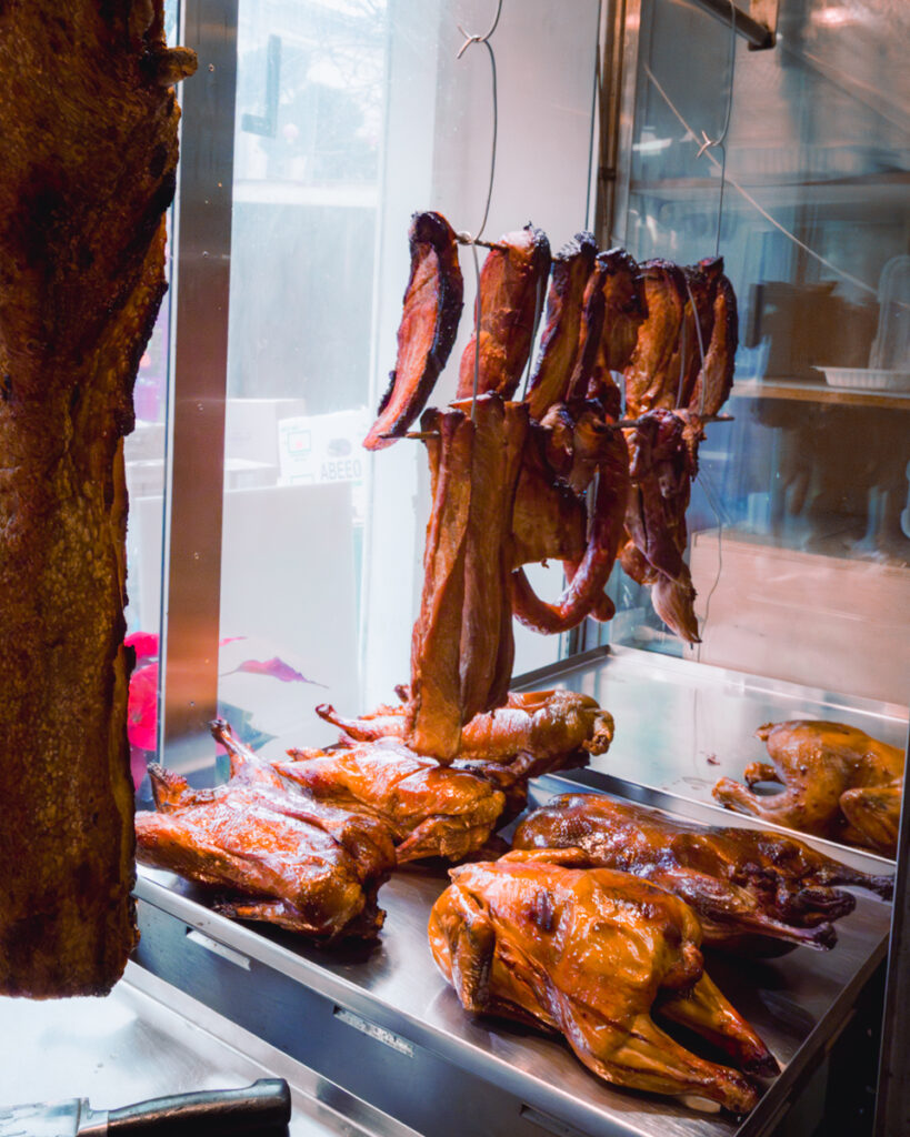 Meat hanging on display  in Chinatown Victoria